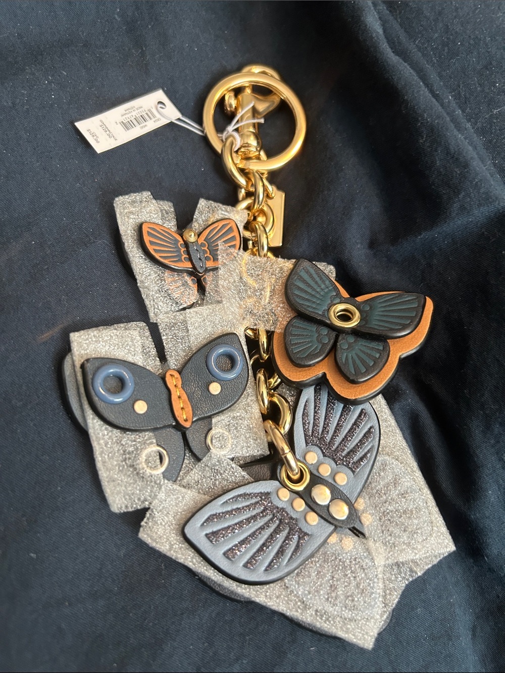 Coach Gold-Tone Butterfly Leather Key & Card Holder Charm - Black & Tan